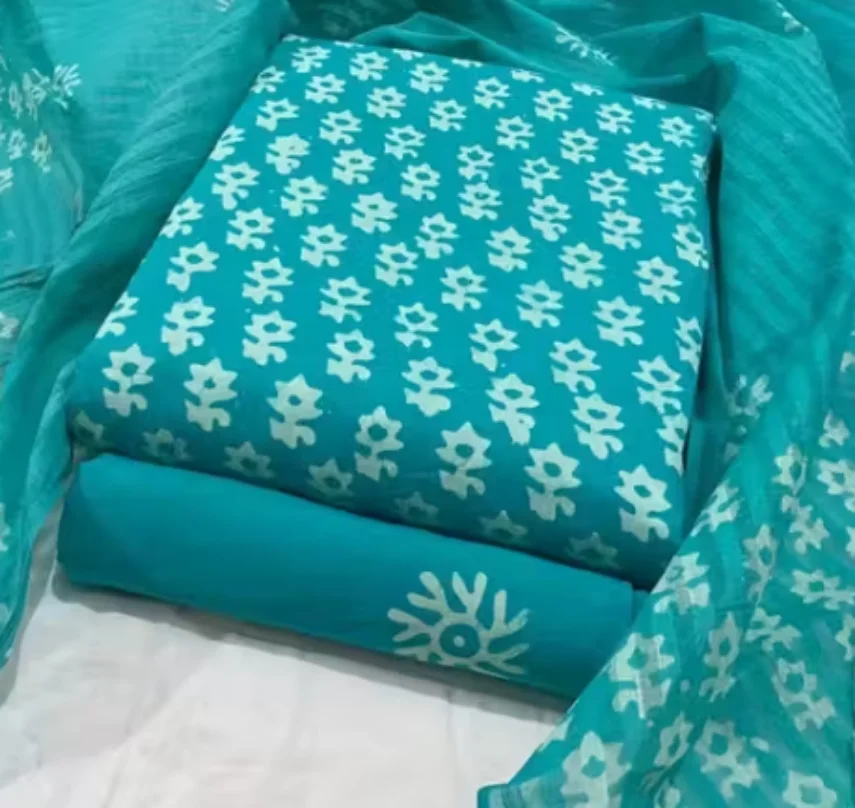 Firozi batik dress material folded for dispatch